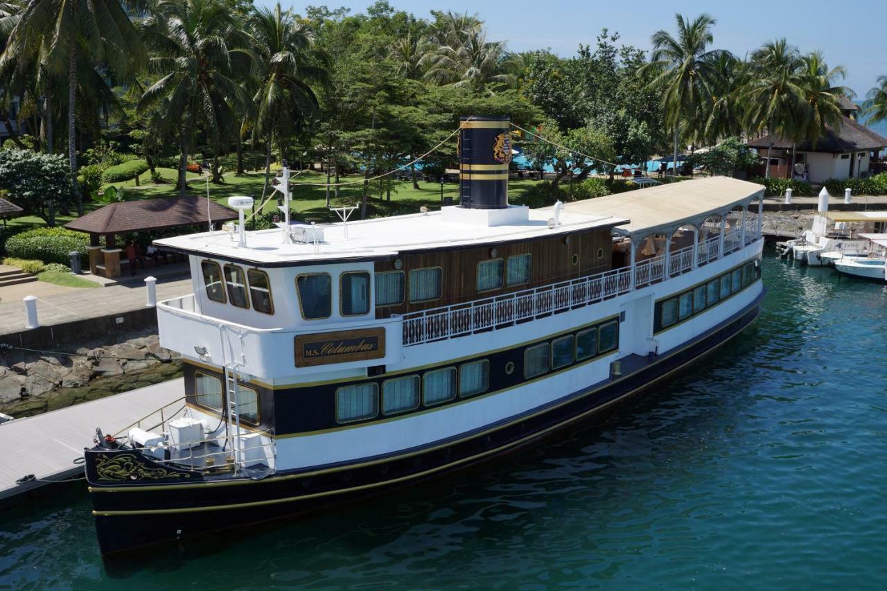 The Pacific Sutera Hotell Kota Kinabalu Exteriör bild The 1912 passenger ship SS President Coolidge at the dock at the Four Seasons Resort